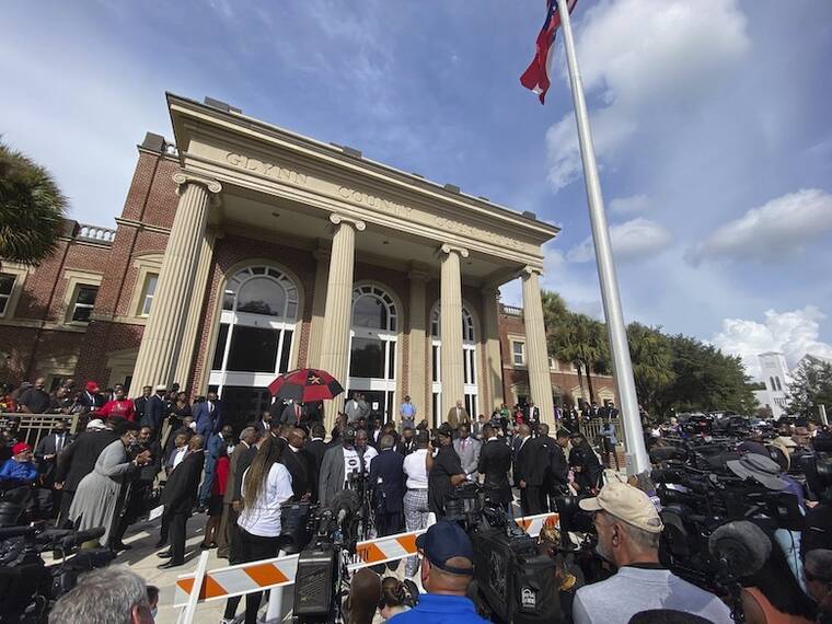 ASSOCIATED PRESS
                                Hundreds of pastors rally during the trial of Greg McMichael and his son, Travis McMichael, and a neighbor, William “Roddie” Bryan outside the Glynn County Courthouse in Brunswick, Ga. The three are charged with the February 2020 slaying of 25-year-old Ahmaud Arbery.