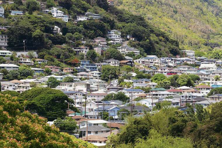 CINDY ELLEN RUSSELL / JULY 15
                                Realigning state House and Senate district seats according to Hawaii’s latest census data has to be finished in February and will affect next year’s elections. Above, a view of homes in the Pauoa neighborhood on Oahu.