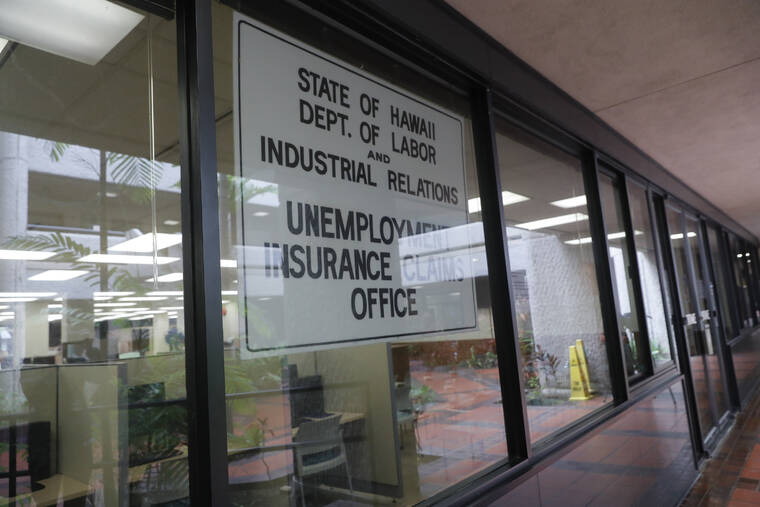 JAMM AQUINO / MARCH 19, 2020
                                Hawaii’s closed Unemployment Insurance Claims office is seen on March 19, 2020, in Honolulu at the start of the coronavirus pandemic. Hawaii’s unemployment offices will reopen for in-person services on Dec. 1, the state Department of Labor & Industrial Relations said today.