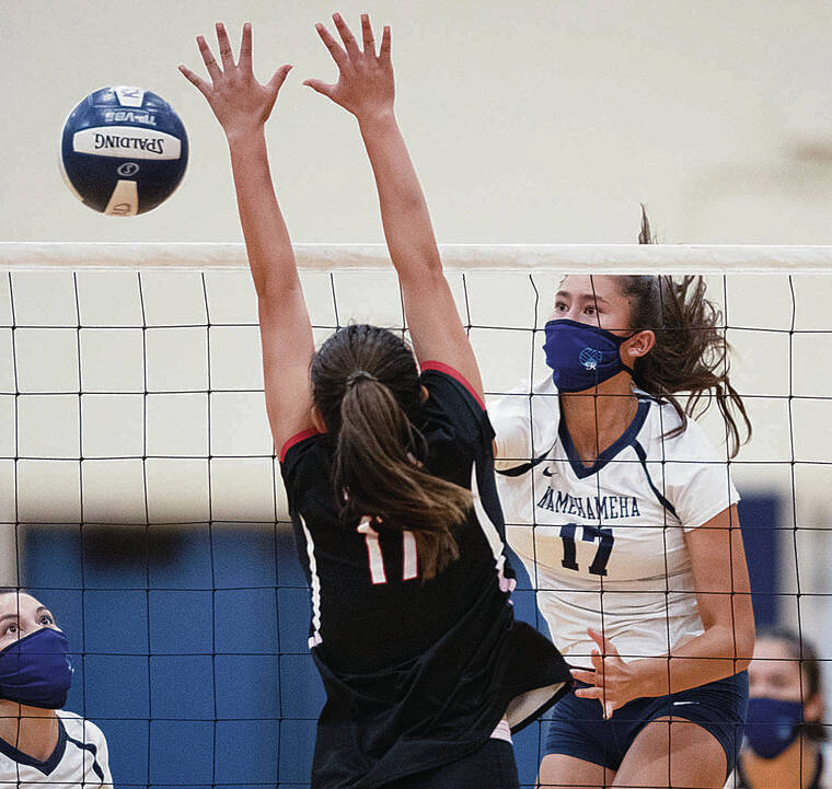 GEORGE F. LEE / GLEE@STARADVERTISER.COM
                                Kamehameha’s Adrianna Arquette goes up for a kill against ‘Iolani’s Callie Pieper.
