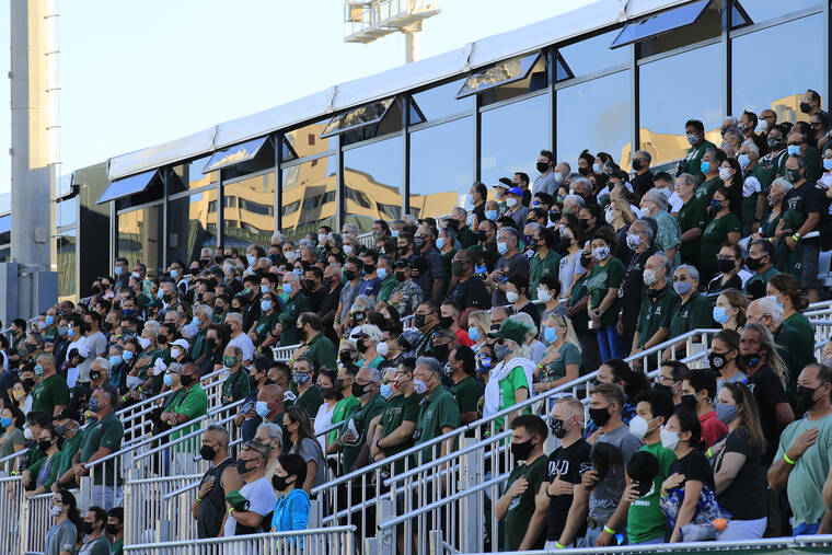 JAMM AQUINO / JAQUINO@STARADVERTISER.COM
                                Fans are seen in the stands during the first half.