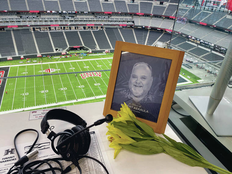 STEPHEN TSAI / STSAI@STARADVERTISER.COM
                                A space in the press box was reserved for the late Robert Kekaula by the UNLV media relations.