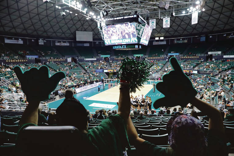 JAMM AQUINO / JAQUINO@STARADVERTISER.COM 
                                Fans performed the wave during the second set of the match between Hawaii and UC Santa Barbara at SimpliFi Arena at the Stan Sheriff Center on Saturday.