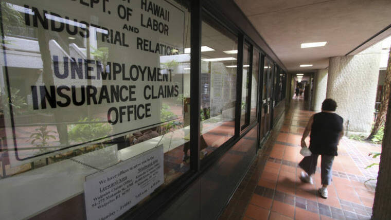 JAMM AQUINO / MARCH 19, 2020
                                The Unemployment Insurance Claims office in Honolulu is seen at the start of the pandemic in 2020.