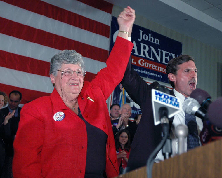 ASSOCIATED PRESS
                                Delaware Gov. Ruth Ann Minner, left, and Lt. Gov. John Carney raise their arms in victory as they celebrate winning their respective races Tuesday, Nov. 2, 2004, in Wilmington, Del. Ann Minner, a sharecropper’s daughter who became the only woman to serve as Delaware’s governor, died on Nov. 4.