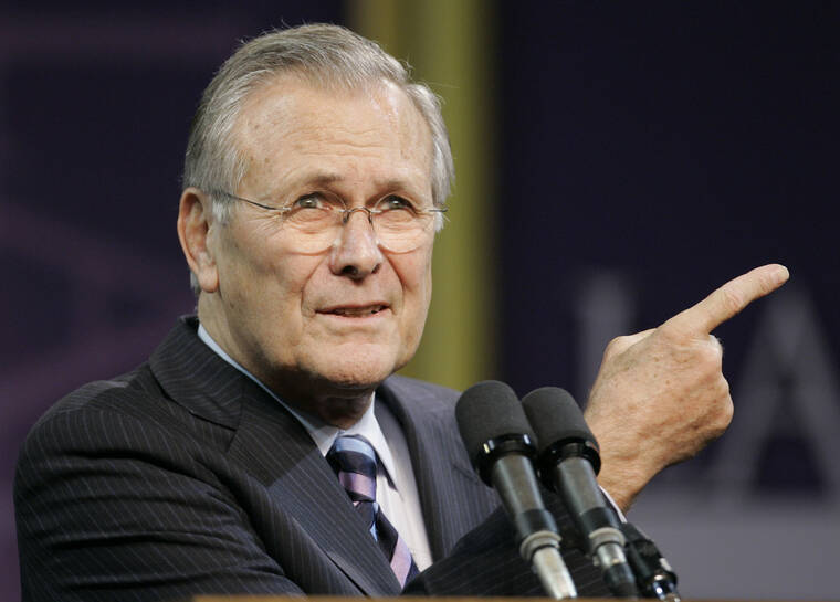 ASSOCIATED PRESS
                                In this Nov. 9, 2006, file photo, Defense Secretary Donald Rumsfeld asks for another question following his Landon Lecture at Kansas State University in Manhattan, Kan. The family of Rumsfeld says he died June 29. He was 88.