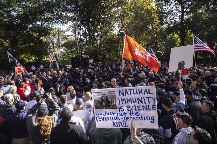 ASSOCIATED PRESS / OCT. 28
                                New York City municipal workers protest against the coming COVID-19 vaccine mandate for city workers outside the Gracie Mansion Conservancy in New York. Millions of health care workers across the U.S. were supposed to have their first dose of a COVID-19 vaccine by this coming Monday, Dec. 6, under a mandate from President Joe Biden’s administration. But that has been placed on hold by federal judges.