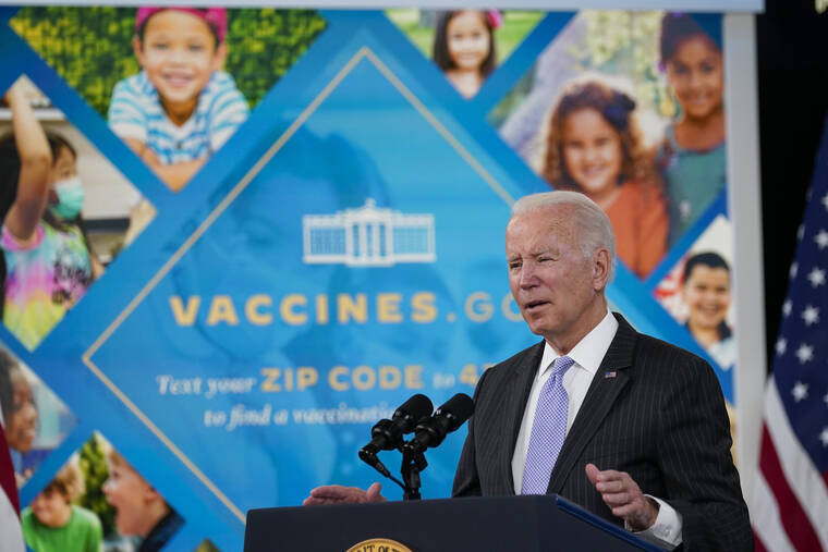 ASSOCIATED PRESS / NOV. 3
                                President Joe Biden talks about the newly approved COVID-19 vaccine for children ages 5-11 from the South Court Auditorium on the White House complex in Washington. Millions of health care workers across the U.S. were supposed to have their first dose of a COVID-19 vaccine by this coming Monday, Dec. 6 under a mandate from President Joe Biden’s administration. But that has been placed on hold by federal judges.