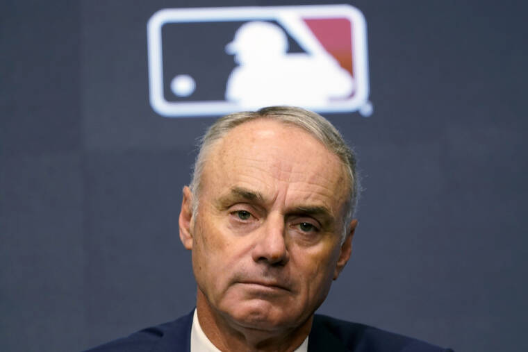 ASSOCIATED PRESS
                                Major League Baseball commissioner Rob Manfred speaks during a news conference in Arlington, Texas, today. Owners locked out players at 12:01 a.m. today following the expiration of the sport’s five-year collective bargaining agreement.