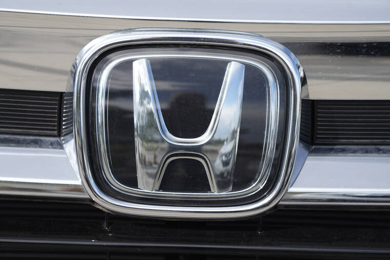 ASSOCIATED PRESS
                                The company logo shined off the grille of an unsold 2021 Pilot sports-utility vehicle outside a Honda dealership, Sept. 12, in Highlands Ranch, Colo. Honda is recalling nearly 723,000 SUVs and pickup trucks, today, because the hoods can open while the vehicles are moving.