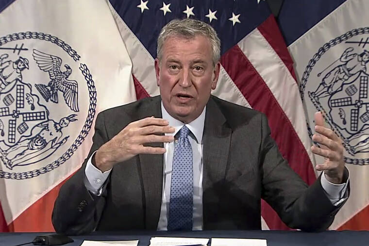ASSOCIATED PRESS
                                In this image taken from video, New York Mayor Bill de Blasio speaks during a virtual news conference Thursday in New York. De Blasio today said that New York City employers will have to mandate COVID-19 vaccinations for their workers.