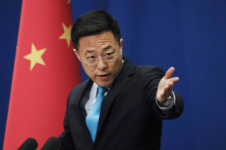 ASSOCIATED PRESS / FEB. 24, 2020
                                Chinese Foreign Ministry spokesperson Zhao Lijian, seen here speaking to the media in Beijing in 2020, said China is threatening to take “firm countermeasures” if the U.S. proceeds with a diplomatic boycott of February’s Beijing Winter Olympic Games.