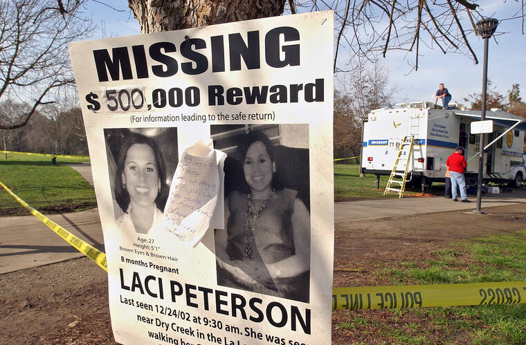 ASSOCIATED PRESS / 2003
                                A missing person poster showing Laci Peterson is seen near the Modesto Police command center in East La Loma Park in Modesto, Calif. Nearly 17 years after being sentenced to die, Scott Peterson was resentenced to life without parole during an emotional hearing in which family members of his slain pregnant wife, Laci, called him out for the killing in 2002 and his apparent lack of remorse.