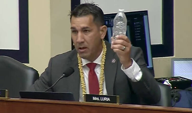 SCREENSHOT VIA TWITTER
                                Hawaii Congressman Kai Kahele holds up a water bottle with contaminated water at during a hearing of the House Armed Services Committee.