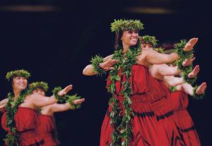 JAMM AQUNIO / 2019
                                Dancers with Halau Mohala Ilima, of Kailua under the direction of kumu Mapuana de Silva, perform during the hula kahiko competition in the 56th annual Merrie Monarch Festival at the Edith Kanakaole Stadium in Hilo.