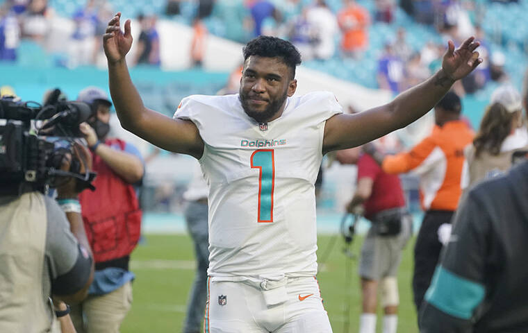 ASSOCIATED PRESS
                                Miami Dolphins quarterback Tua Tagovailoa (1) gestures at the end of an NFL football game against the New York Giants today in Miami Gardens, Fla. The Dolphins defeated the Giants 20-9.