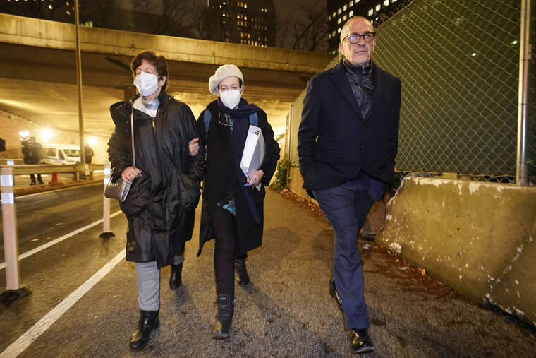 ASSOCIATED PRESS / DEC. 29
                                Christine Maxwell, left, Isabel Maxwell, center, and Kevin Maxwell, siblings of Ghislaine Maxwell, leave the courthouse after a verdict in New York. British socialite Ghislaine Maxwell was convicted of luring teenage girls to be sexually abused by American millionaire Jeffrey Epstein.
