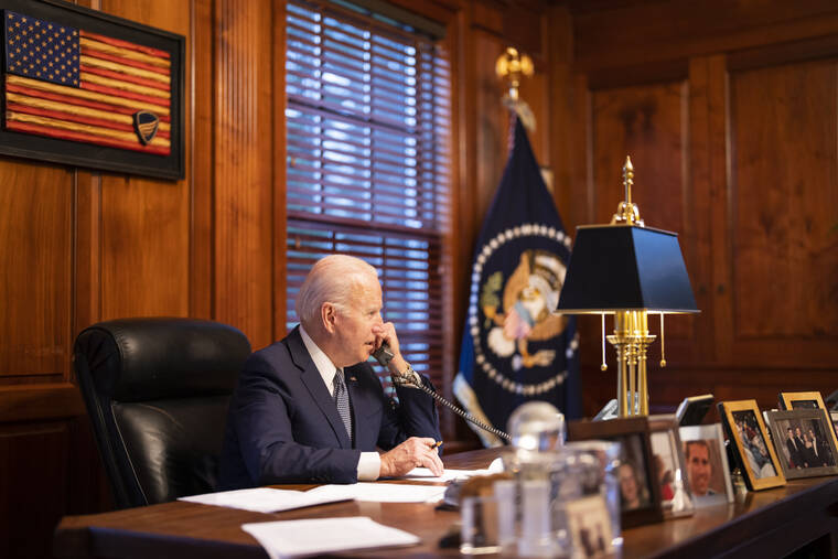 ADAM SCHULTZ/THE WHITE HOUSE VIA ASSOCIATED PRESS
                                President Joe Biden spoke with Russian President Vladimir Putin on the phone from his private residence in Wilmington, Del., today.