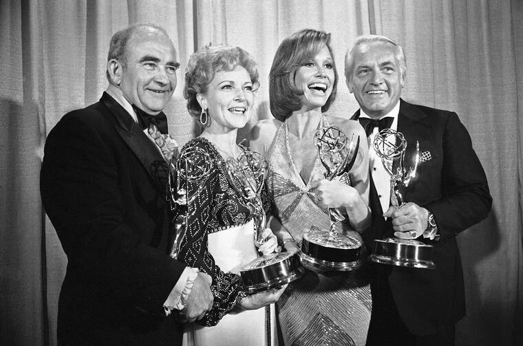 ASSOCIATED PRESS / MAY 18, 1976
                                Cast members of the “Mary Tyler Moore Show,” pose with their Emmys backstage, at the 28th annual Emmy Awards in Los Angeles. From left are, Ed Asner, Betty White, Mary Tyler Moore and Ted Knight. White, a television mainstay for more than 60 years, has died. She was 99.