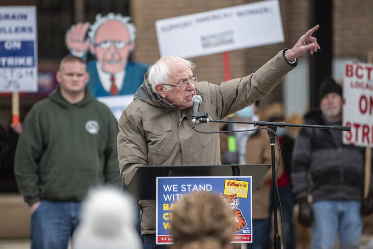 ALYSSA KEOWN/BATTLE CREEK ENQUIRER VIA AP / DEC. 17
                                U.S. Sen. Bernie Sanders, I-Vt., speaks at a rally with striking Kellogg workers at Festival Market Square in downtown Battle Creek, Mich. Kellogg’s reached a new tentative agreement this week with its 1,400 striking cereal plant workers that could bring an end to the strike that began Oct. 5. The results of the contract vote are expected to be released next week.