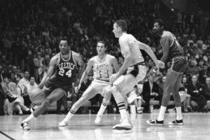 ASSOCIATED PRESS / 1968
                                Boston’s Sam Jones, left, drives past the Lakers’ Jerry West (44) and drives along the baseline towards the basket in the teams’ NBA playoff game in Los Angeles. At right are Darrall Imhoff of Lakers, who blocked the shot, and Celtics’ Bill Russell. Basketball Hall of Famer Jones, the skilled scorer whose 10 NBA titles is second only to teammate Bill Russell, died on Thursday, Dec. 30, the team said. He was 88.