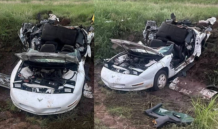 COURTESY MAUI POLICE DEPARTMENT The driver apparently lost control of his vehicle and collided into a guard rail before crossing both the southbound and northbound lanes and through the intersection of Leialii Parkway into a dirt field and then a ravine.
