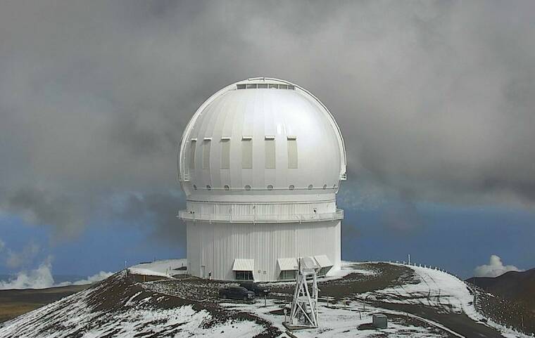 CANADA-FRANCE-HAWAII TELESCOPE
                                A light dusting of snow could be seen around the Canada-France-Hawaii telescope atop Mauna Kea this morning.