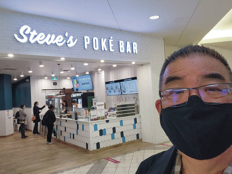 While at the Metropolis at Metrotown mall in Burnaby, Canada, Howard Komori of Salt Lake snapped a selfie in front of Steve’s Poke Bar in September.