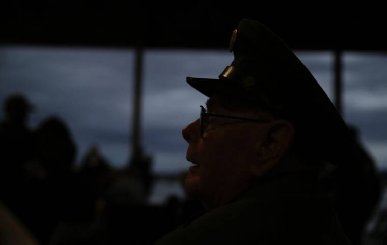 JAMM AQUINO / JAQUINO@STARADVERTISER.COM
                                U.S. Army WWII veteran John Pildner looked on during the 80th commemoration of the attack on Pearl Harbor.
