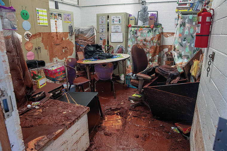 CINDY ELLEN RUSSELL / CRUSSELL@STARADVERTISER.COM
                                Pearl City Highlands Elementary School was inundated by a flash flood on Monday. All the students and staff were evacuated safely. Pictured is the speech therapy services classroom on Tuesday.
