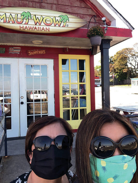 While on a historic tour in October, Honolulu residents Margaret Dang and Sonya Yamasaki saw Plymouth Rock and, surprisingly, discovered a Maui Wowi smoothie and coffee shop in Plymouth, Mass. Photo by Margaret Dang.