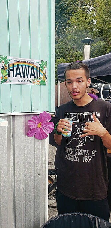 Christopher Makana Holden spotted a ­Hawaii license plate while attending the Main Street Music Fest in Old Ellicott City, Md., in October. Photo by Stephanie Holden.