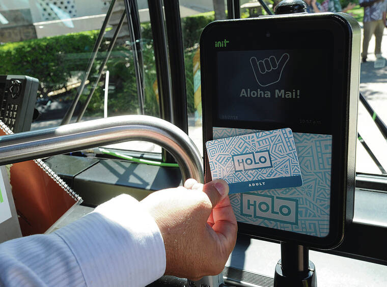 STAR-ADVERTISER FILE
                                On Thursday online services for TheBus, TheHandi-Van, TheBus app and its Holo card system were shut down by hackers and remain offline. A Holo card is read by a card reader on board TheBus.