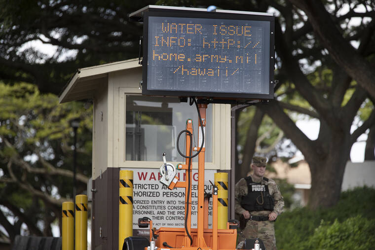 GEORGE F. LEE / GLEE@STARADVERTISER.COM
                                An electronic billboard at the gate of the U.S. Army’s Red Hill facility is seen on Dec. 2.