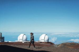 RONIT FAHL / SPECIAL TO THE STAR-ADVERTISER / 2019
                                A new report says more Native Hawaiians should be included in the management of observatories on Mauna Kea. Above, a tourist walks the summit near telescopes.