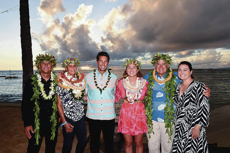 COURTESY HAWAI‘I WATERMAN HALL OF FAME
                                Shane Dorian, left, Kelly Fey, Hawai‘i Waterman Hall of Fame Chairman Bill Pratt, Carissa Moore, Michael Spalding and Justine Miller posed on the beach at the Outrigger Canoe Club during an induction ceremony Thursday.