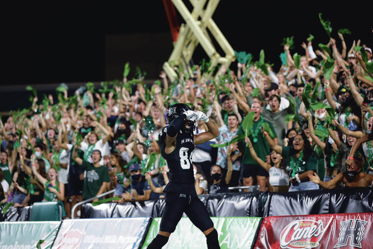 JAMM AQUINO / JAQUINO@STARADVERTISER.COM
                                Hawaii wide receiver Nick Mardner celebrates after a touchdown against the Colorado State Rams on Nov. 20.