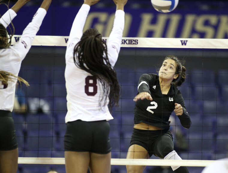 ANTHONY BOLANTE / SPECIAL TO THE STAR-ADVERTISER
                                Hawaii’s Brooke Van Sickle put down a kill past Mississippi State’s Gabby Waden during the first period of Friday’s first-round NCAA Tournament match in Seattle.