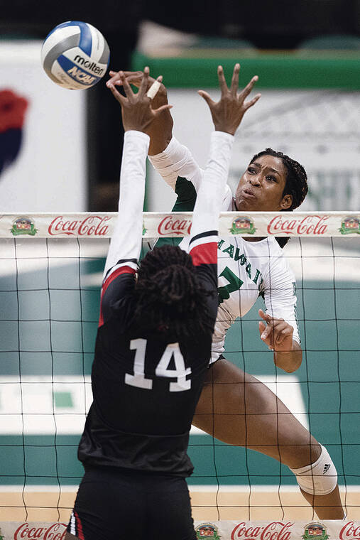 GEORGE F. LEE / NOV. 26
                                Wahine middle Amber Igiede hit against Cal State Northridge. Igiede was an honorable mention selection on the All-Pacific North Region team.