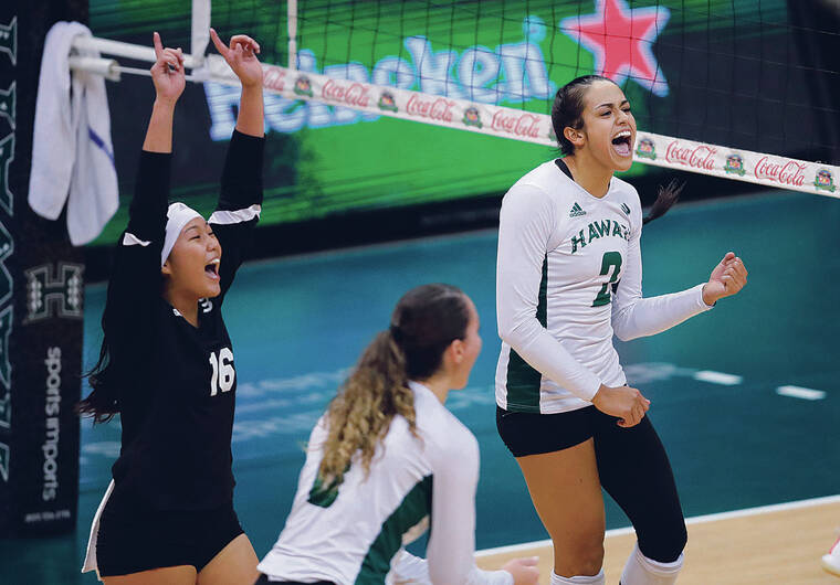 JAMM AQUINO / NOV. 12
                                UH outside hitter Brooke Van Sickle, far right, was pumped after a point against UC Irvine.