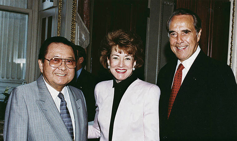 COURTESY ROBERT AND ELIZABETH DOLE ARCHIVE
                                U.S. Sens. Daniel Inouye, left, and Bob Dole rehabbed after WWII in the same hospital and had a friendship that transcended politics. Also pictured is Dole’s wife, Elizabeth.