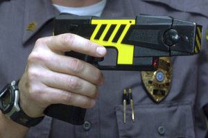 ASSOCIATED PRESS
                                An officer holds a stun gun used by his police department in a Farmington, Conn.