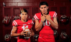 JAMM AQUINO
                                Pictured are Kahuku Offensive Player of the Year Kainoa Carvalho, left, and Kahuku Defensive Player of the Year Liona Lefau.