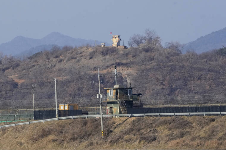 ASSOCIATED PRESS
                                Military guard posts of North Korea, rear, and South Korea, front, are seen in Paju, near the border with North Korea, South Korea.