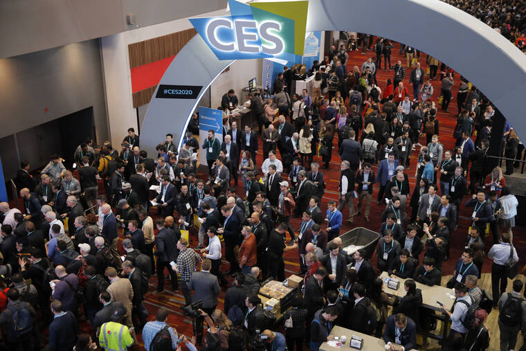 ASSOCIATED PRESS
                                Crowds entered the convention center on the first day of the CES tech show, in January 2020, in Las Vegas. A long-simmering question in the tech world will finally get its answer as the influential gadget show returns to the Las Vegas Strip after a hiatus caused by the COVID-19 pandemic.