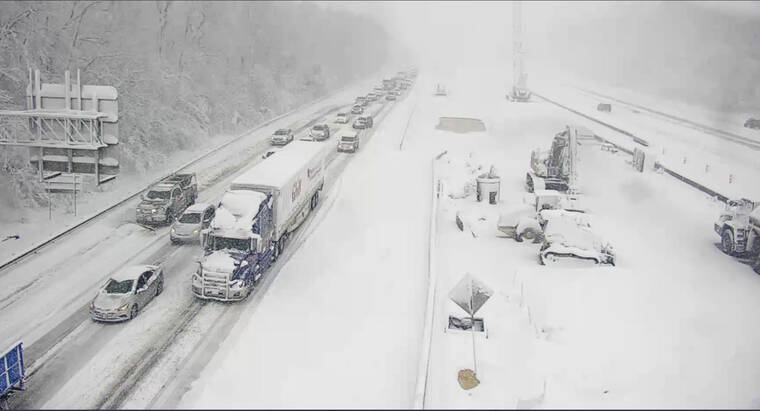 VIRGINIA DEPARTMENT OF TRANSPORTATION VIA ASSOCIATED PRESS
                                This image provided by the Virginia Department of Transportation shows a closed section of Interstate 95 near Fredericksburg, Va,. Monday. Both northbound and southbound sections of the highway were closed due to snow and ice.