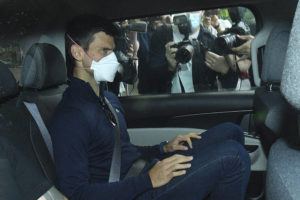 AAP VIA AP
                                Serbian tennis player Novak Djokovic rides in car as he leaves a government detention facility before attending a court hearing at his lawyers office in Melbourne, Australia, today.