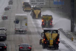 ASSOCIATED PRESS
                                Vehicles navigate hazardous driving conditions along Interstate 85/40 as a winter storm moves through the area in Mebane, N.C., today.