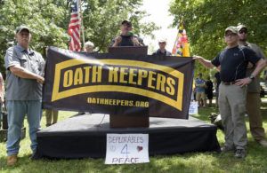 ASSOCIATED PRESS
                                Stewart Rhodes, founder of the citizen militia group known as the Oath Keepers, center, speaks during a rally outside the White House in Washington, on June 25, 2017.