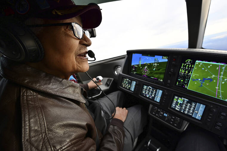 ASSOCIATED PRESS / DECEMBER 2019
                                \Retired U.S. Air Force Col. Charles McGee, a Tuskegee Airman and a decorated veteran of three wars, flies a Cirrus SF50 Vision Jet with assistance from pilot Boni Caldeira during a round trip flight from Frederick, Md., to Dover Air Force Base in Delaware. McGee, one of the last surviving Tuskegee Airmen who flew 409 fighter combat missions over three wars, died Sunday, Jan. 16. He was 102